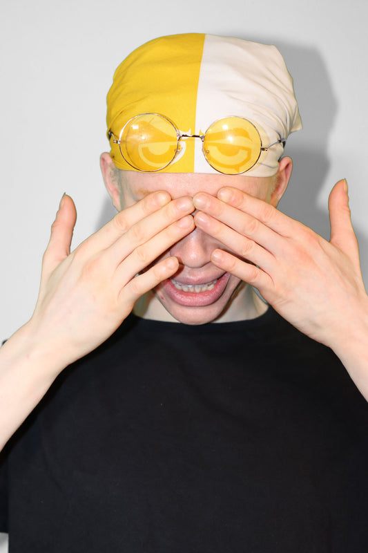 Model wearing yellow bandana